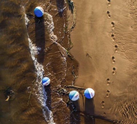 Red Beach Mooring Balls, by Local artist Larry Glick